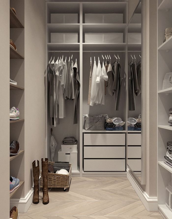 heros-img Stylish walk-in closet with neutral tones and contemporary design elements.